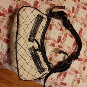 Dooney and Bourke clutch sized handbag